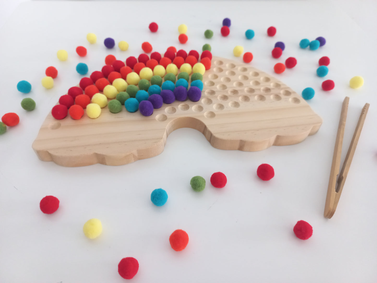 Wooden Rainbow Board with Pom Poms