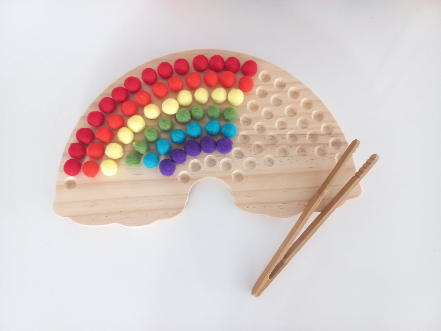 Wooden Rainbow Board with Pom Poms